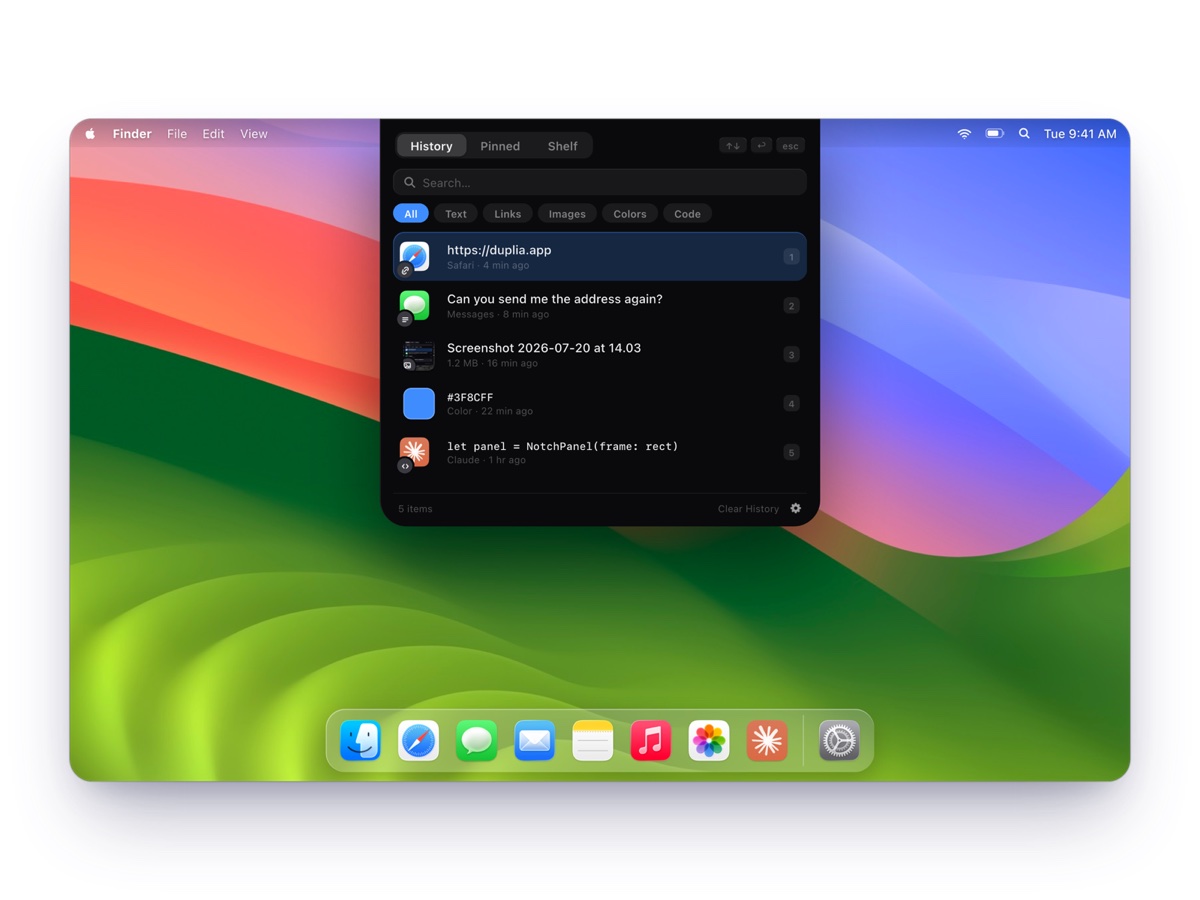 Duplia’s clipboard history panel open on a MacBook